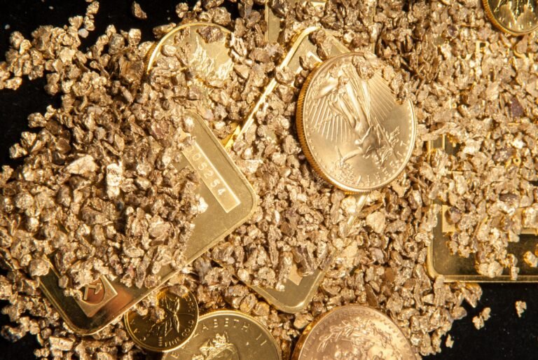 large samples of pure gold in various forms including coins, ingots, bars, dust and nuggets